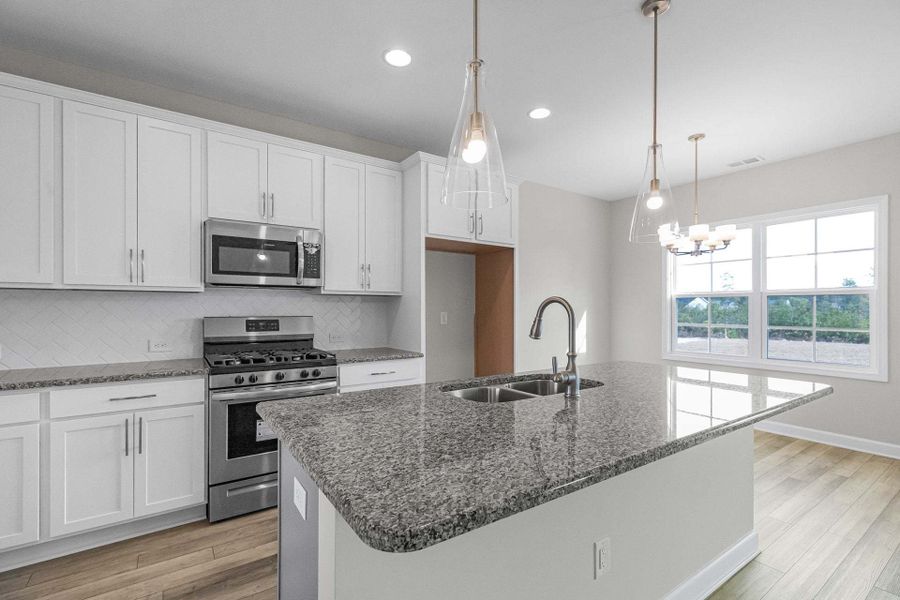 Representative furnished interior of a home built from the Clayton by Caviness & Cates Communities in Bartlett Manor, Youngsville (Image 145).