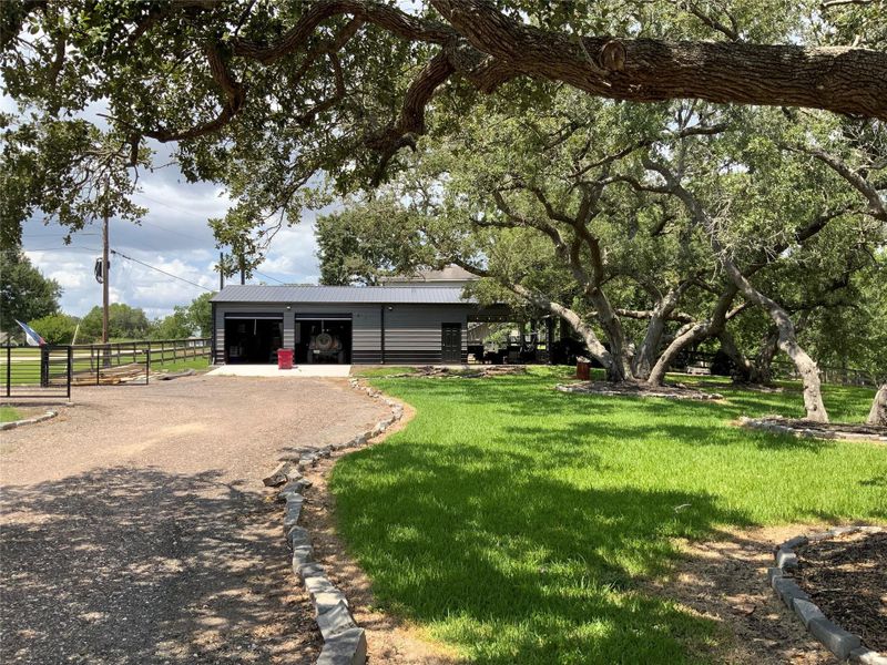Front exterior of a new home in , Palacios, TX, highlighting curb appeal (Image 16). Front exterior of a new home in , Palacios, TX, highlighting curb appeal (Image 16).