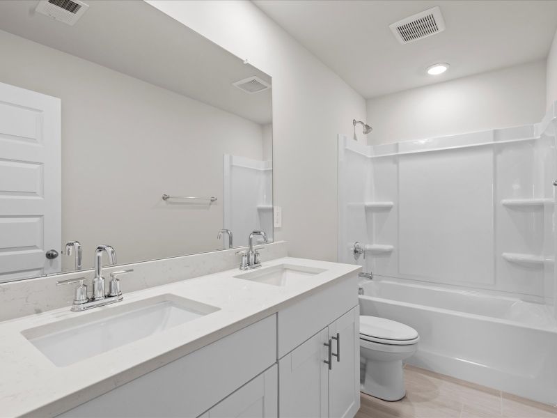 Furnished interior view inside a new home in Brayfield Manor - Heritage Collection, Wellford (Image 7).