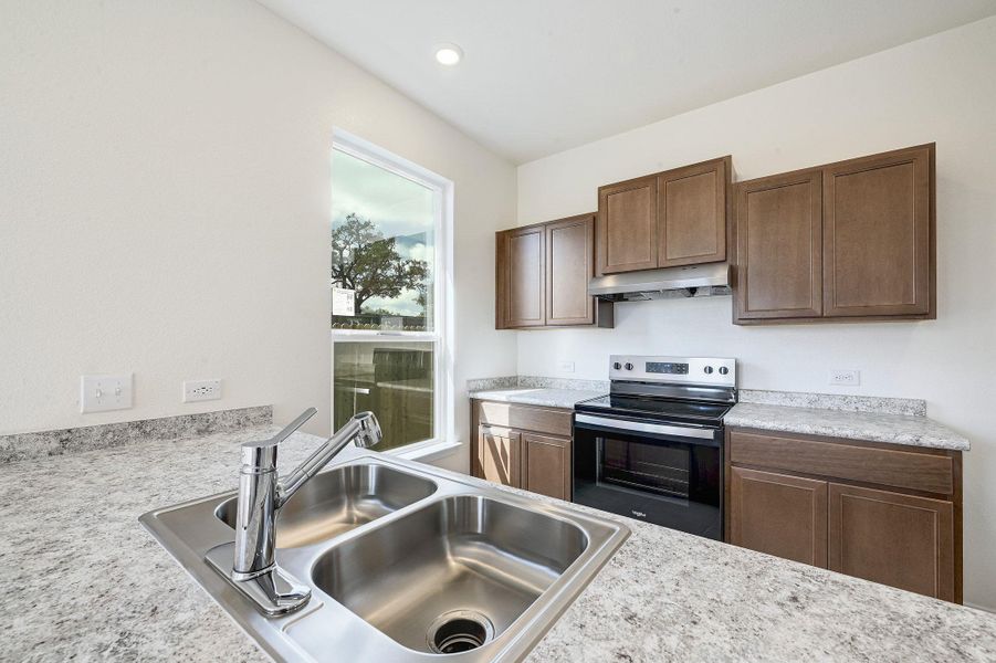 Furnished interior view inside a new home in Creekside at Estancia, Austin (Image 4).