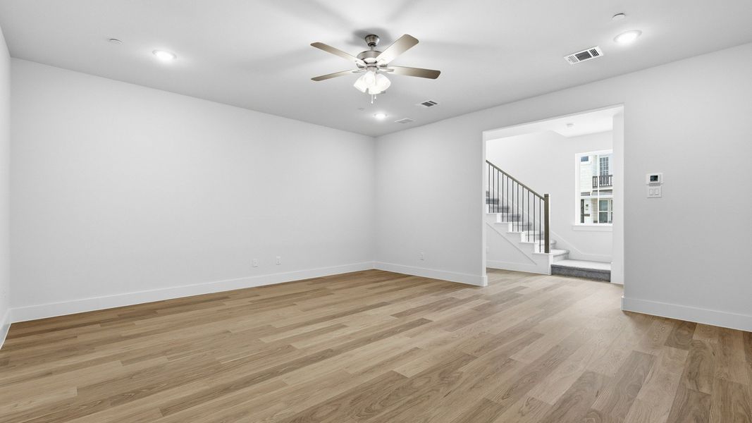 Furnished interior view inside a new home in Collin Creek, Plano (Image 11).