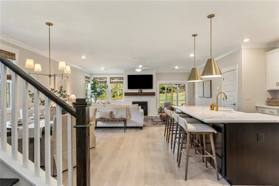 This bright, open concept living space features a This bright, open concept living space features a