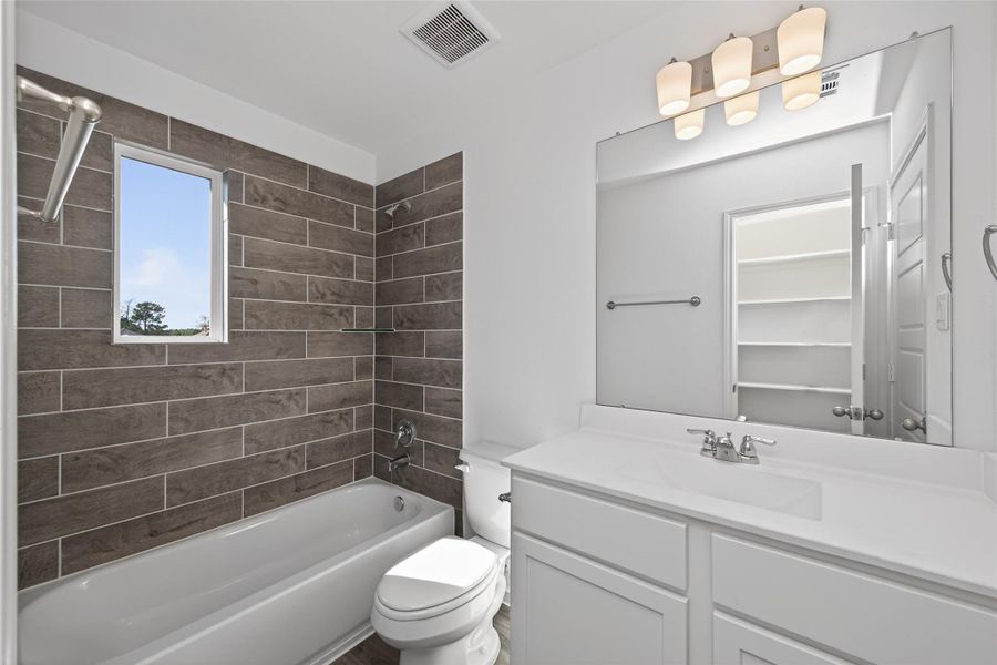 Furnished interior view inside a new home in Enclave at Willis, Willis (Image 16).