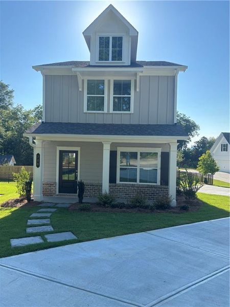 Front exterior of a new home in , Marietta, GA, highlighting curb appeal (Image 1). Front exterior of a new home in , Marietta, GA, highlighting curb appeal (Image 1).