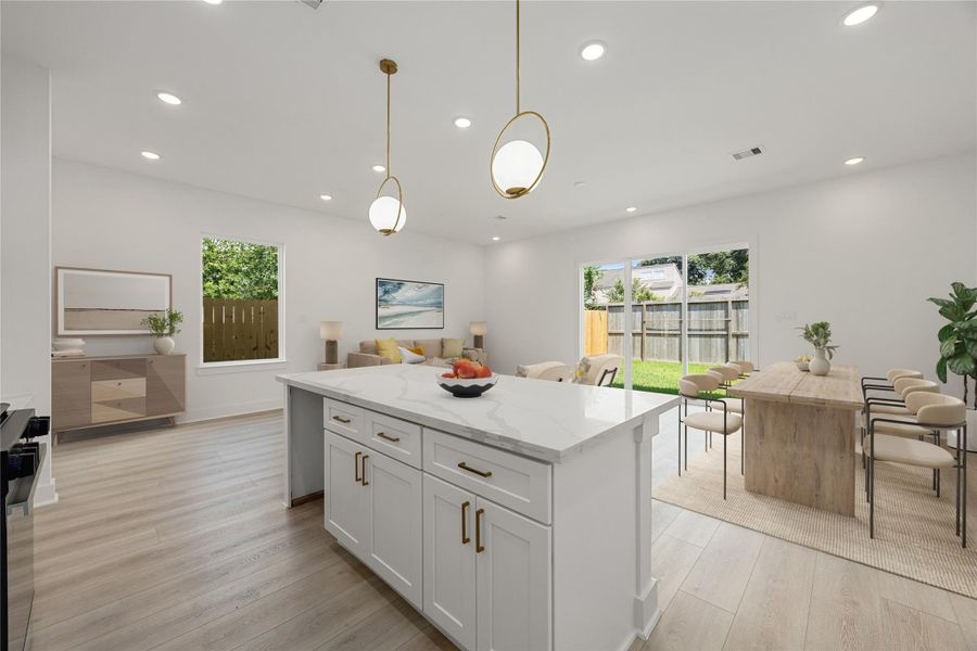 This kitchen is by far any chef’s dream! This spacious kitchen features large windows, high ceilings, white cabinets, quartz countertops, SS appliances, modern tile backsplash, recessed lighting with additional custom pendant lighting, quartz kitchen island with space for breakfast bar and a pantry all overlooking your huge family room. This kitchen is by far any chef’s dream! This spacious kitchen features large windows, high ceilings, white cabinets, quartz countertops, SS appliances, modern tile backsplash, recessed lighting with additional custom pendant lighting, quartz kitchen island with space for breakfast bar and a pantry all overlooking your huge family room.