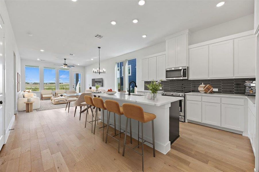 Furnished interior view inside a new home in North Square at Uptown, Celina (Image 15).