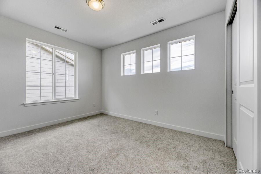 Spacious, unfurnished interior of a new home in Newlin Crossing, Parker (Image 16).