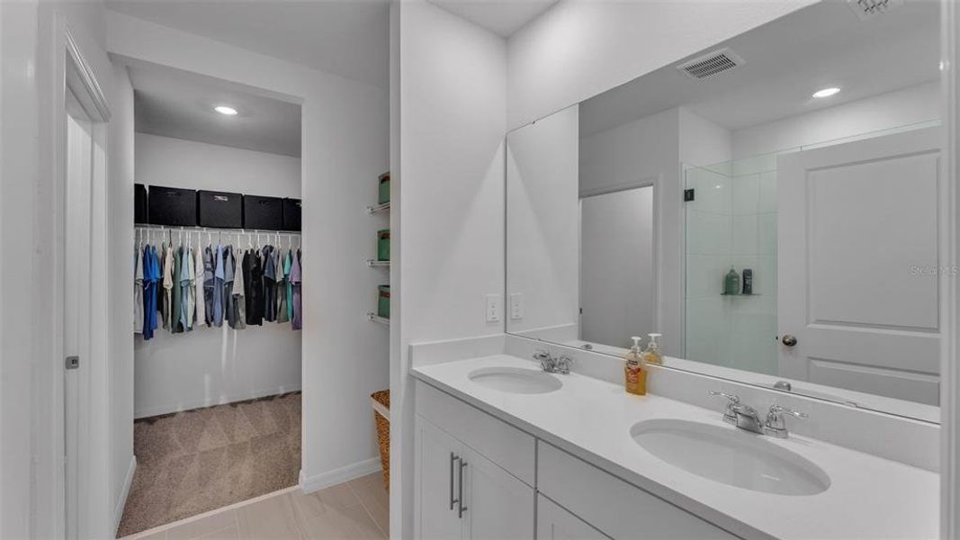 Furnished interior view inside a new home in The Grove at Stuart Crossing - Premier Series, Bartow (Image 28).