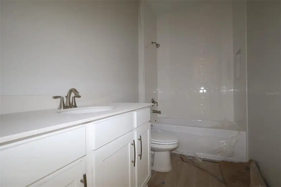 Furnished interior view inside a new home in Emerson Pointe, Apopka (Image 6).