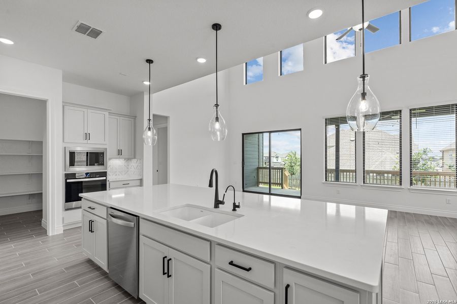 Furnished interior view inside a new home in Bison Ridge, San Antonio (Image 31).