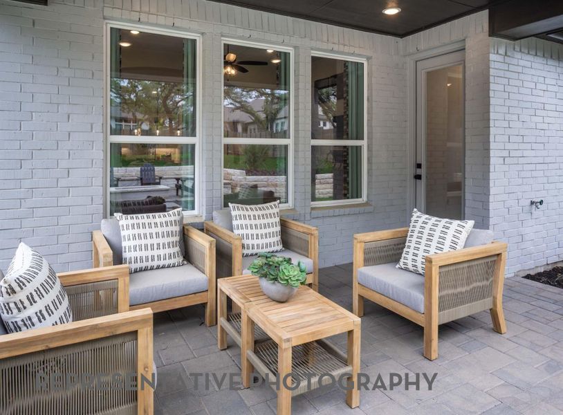 Exterior details and patio area of a home in Midline, Webster (Image 20).