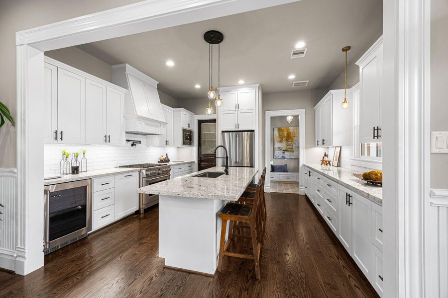 The kitchen is truly the heart of this home - both in size, efficiency, finishes...and appliances! The kitchen is truly the heart of this home - both in size, efficiency, finishes...and appliances!