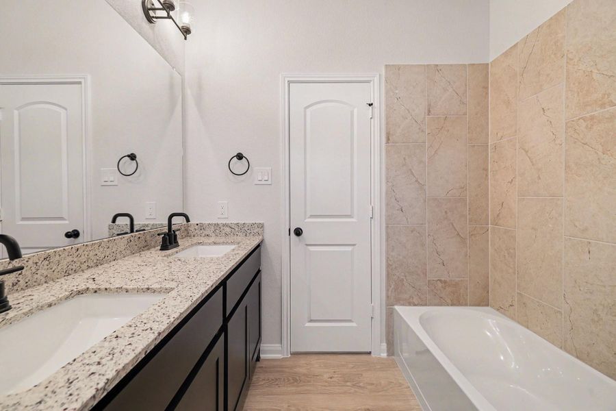 Furnished interior view inside a new home in Rose Hill Estates, Willis (Image 13).