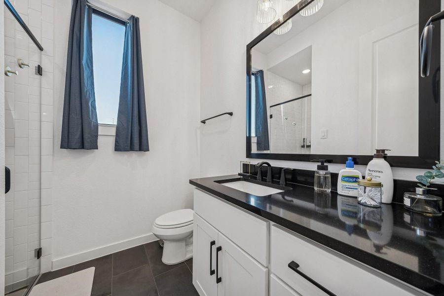 This 1st floor full bath is just outside Bedroom #2, perfect for guests.