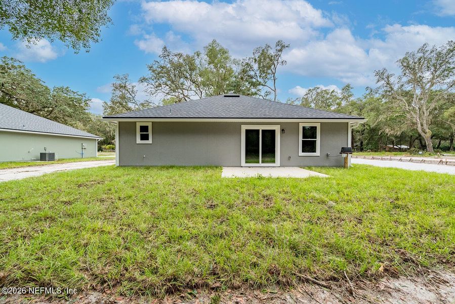 Exterior details and patio area of a home in , Florahome (Image 3).