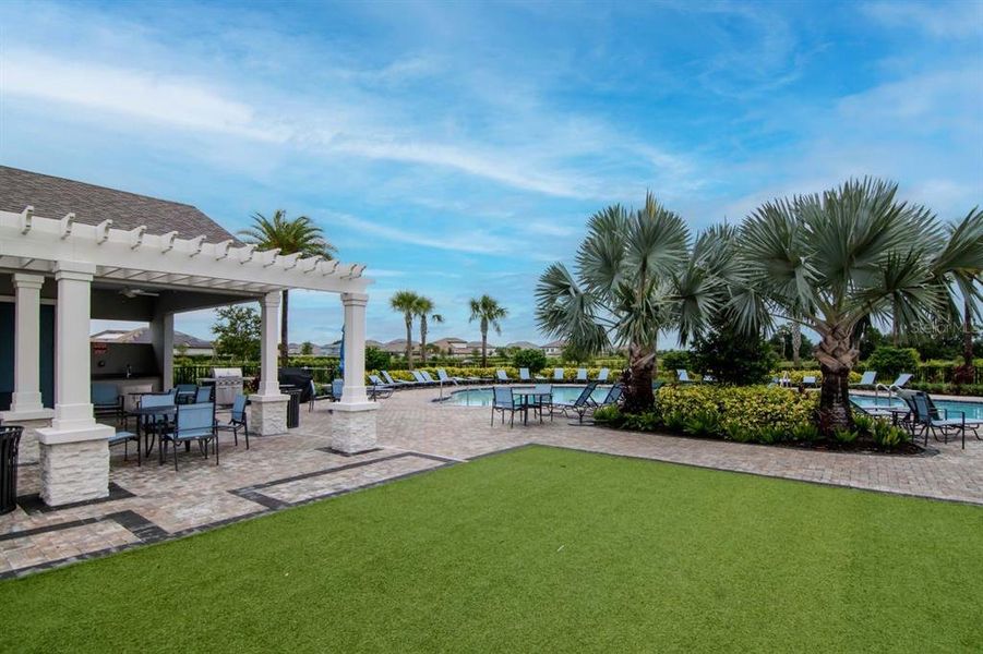Exterior details and patio area of a home in River Landing, Wesley Chapel (Image 3).
