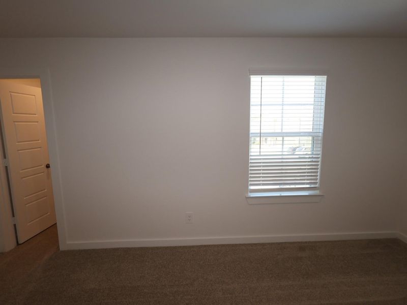 Spacious, unfurnished interior of a new home in Pinewood at Grand Texas, New Caney (Image 20).