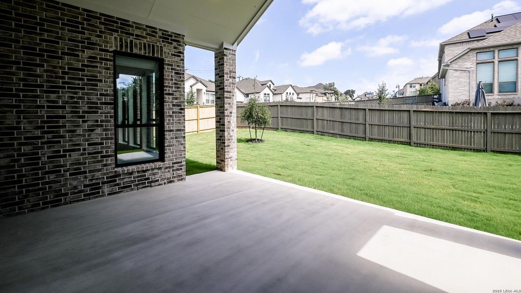 Exterior details and patio area of a home in Kinder Ranch, San Antonio (Image 23).