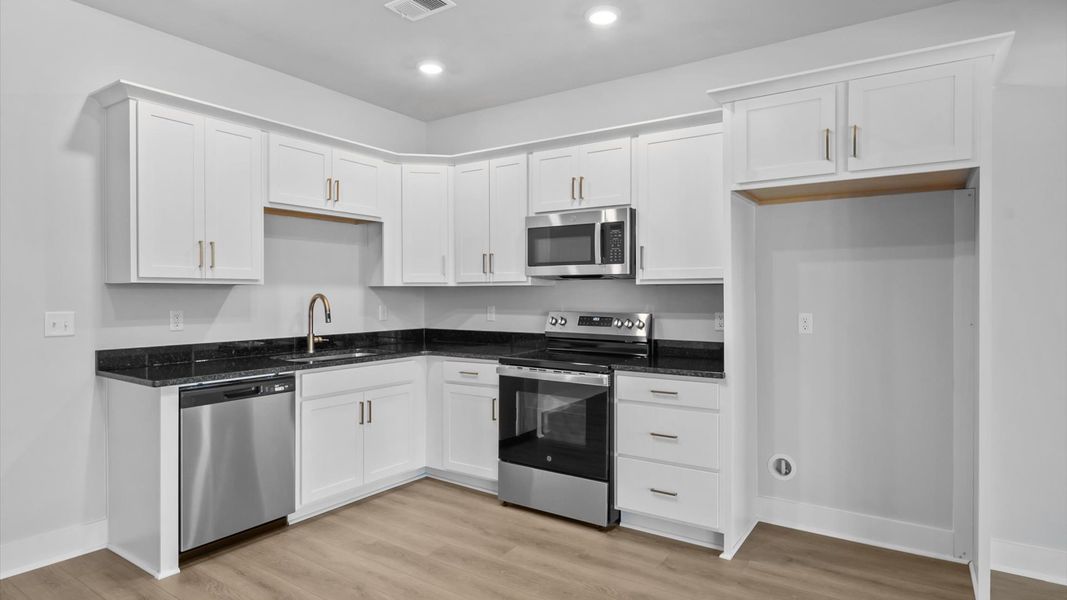 First-rate basement kitchenette in a thoughtfully designed space