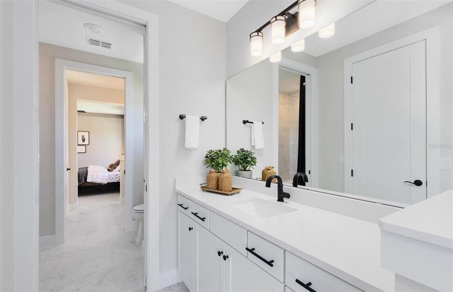 Furnished interior view inside a new home in Parkside Trails, Clermont (Image 17).