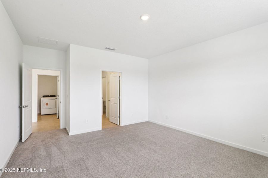 Spacious, unfurnished interior of a new home in Lakes at Bella Lago - Signature Series, Green Cove Springs (Image 22).