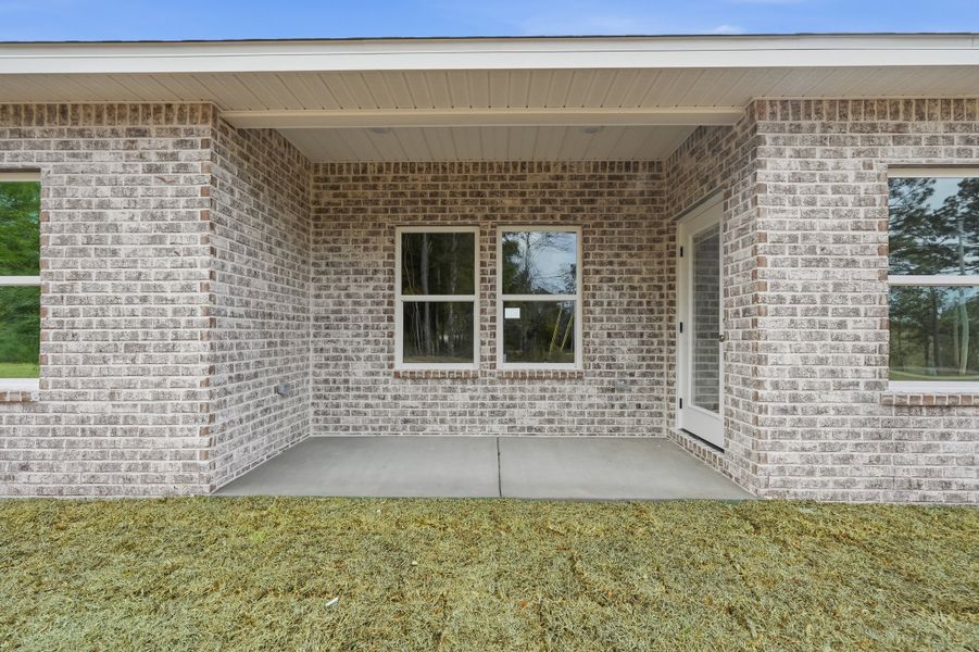 Exterior details and patio area of a home in Southern Charm, Crestview (Image 23).