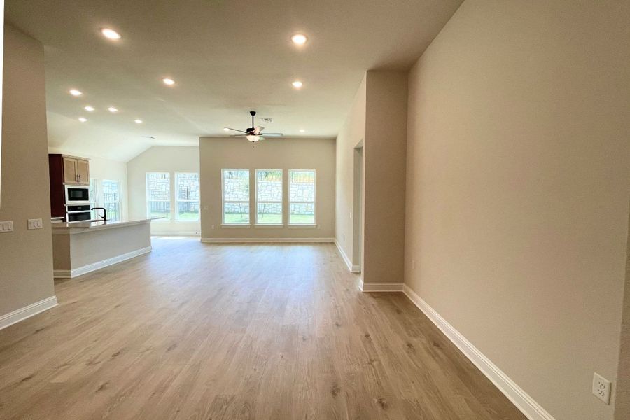 Spacious, unfurnished interior of a new home in Whisper Valley, Manor (Image 14).