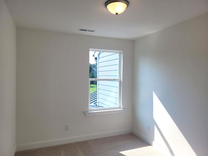 Spacious, unfurnished interior of a new home in Enclave at Traditions Townhomes, Wake Forest (Image 13).