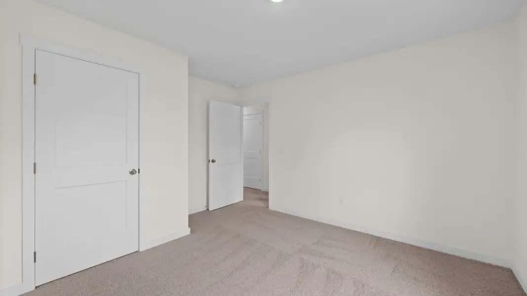 Representative unfurnished interior of a home built from the Tatum Townhome by D.R. Horton in Cherokee Overlook, Sevierville (Image 27).