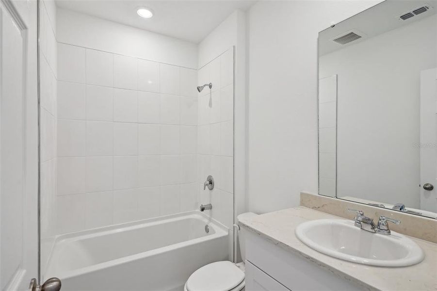 Furnished interior view inside a new home in Lake Deer Estates - Signature Series, Poinciana (Image 14). Furnished interior view inside a new home in Lake Deer Estates - Signature Series, Poinciana (Image 14).