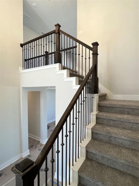 Beautiful Stairway with Soaring Ceilings