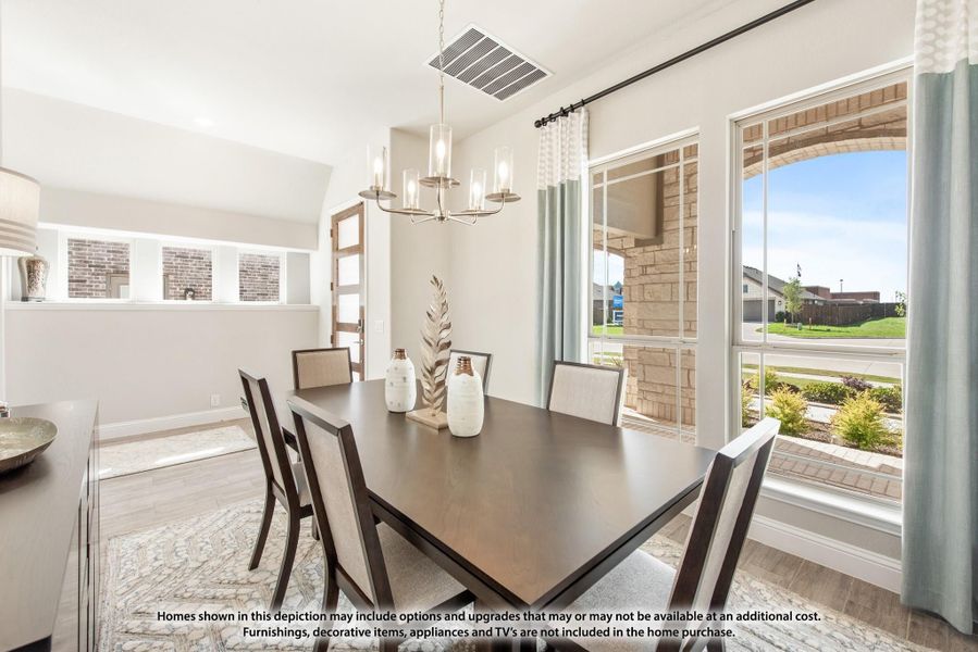 Dining room with dark wood table, six chairs, chandelier, and large windows with neighborhood view Dining room with dark wood table, six chairs, chandelier, and large windows with neighborhood view