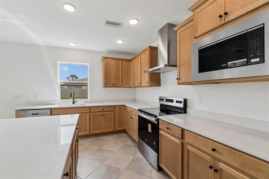 Furnished interior view inside a new home in Avalon West, Spring Hill (Image 17).