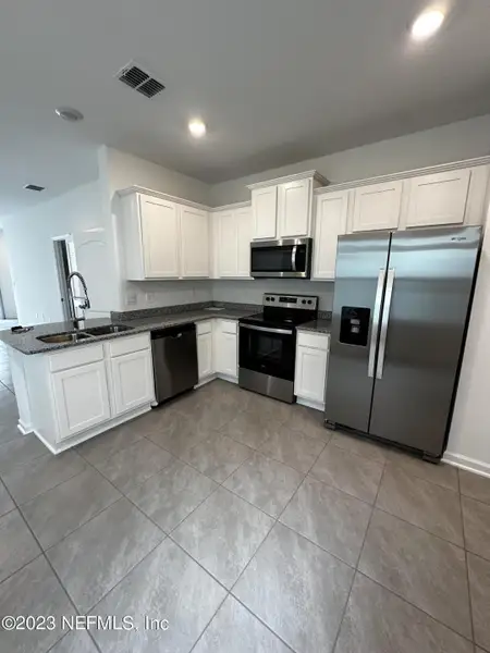Furnished interior view inside a new home in , St. Augustine (Image 10).