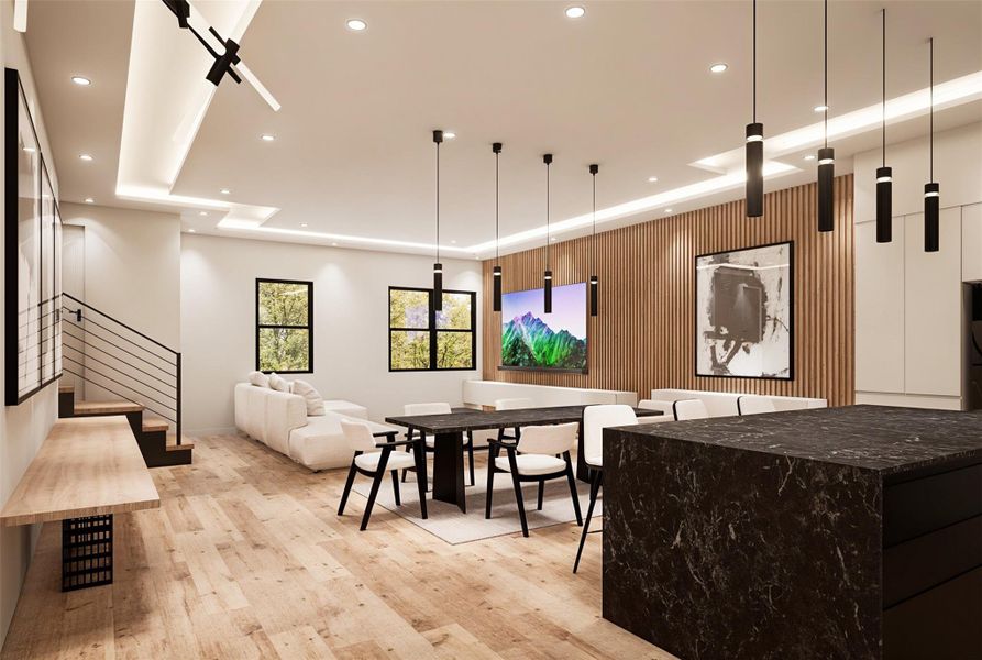 Modern open concept in living, kitchen, dining areas with high quality finishes and lighting.