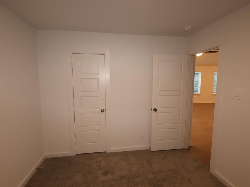 Spacious, unfurnished interior of a new home in Pinewood at Grand Texas, New Caney (Image 6).