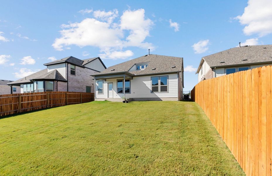 Exterior details and patio area of a home in Saddleback at Santa Rita Ranch, Liberty Hill (Image 3).