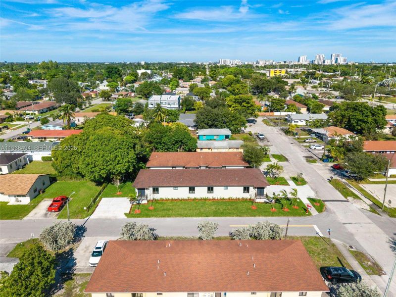 Front exterior of a new home in , Hallandale Beach, FL, highlighting curb appeal (Image 19).