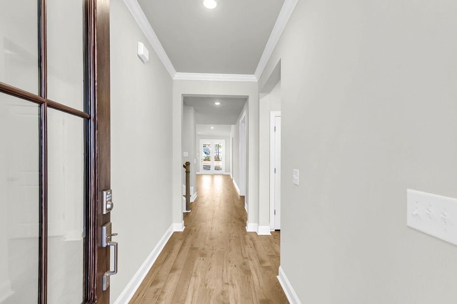 Spacious, unfurnished interior of a new home in Tidewater at Lakes of Cane Bay, Summerville (Image 20).