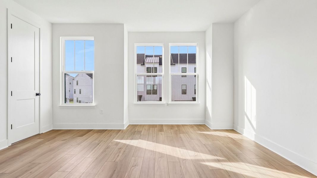 Furnished interior view inside a new home in Parkview at Hamlin, Winter Garden (Image 10).