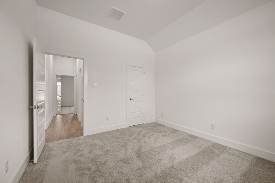 Spacious, unfurnished interior of a new home in Saddleback Estates, Boyd (Image 31).