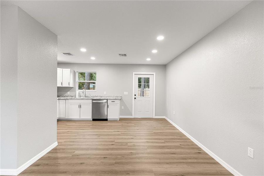 Spacious, unfurnished interior of a new home in , Fort McCoy (Image 17).