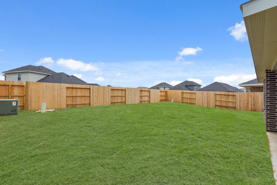 Front exterior of a new home in Cypress Green, Hockley, TX, highlighting curb appeal (Image 2). Front exterior of a new home in Cypress Green, Hockley, TX, highlighting curb appeal (Image 2).
