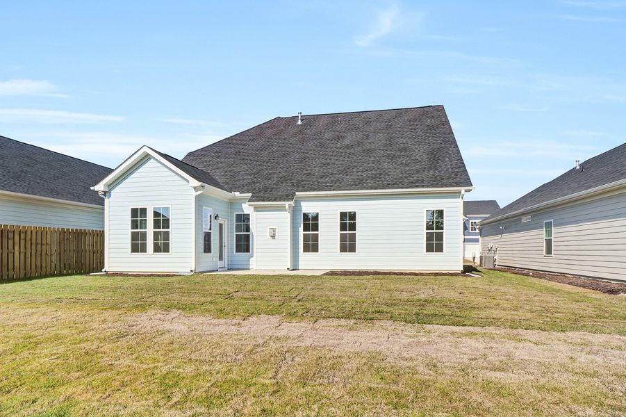 Exterior details and patio area of a home in Grand Park, Leland (Image 4).