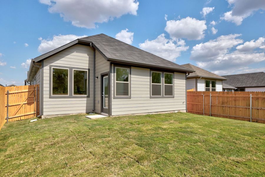Exterior details and patio area of a home in Trinity Ranch, Elgin (Image 21).