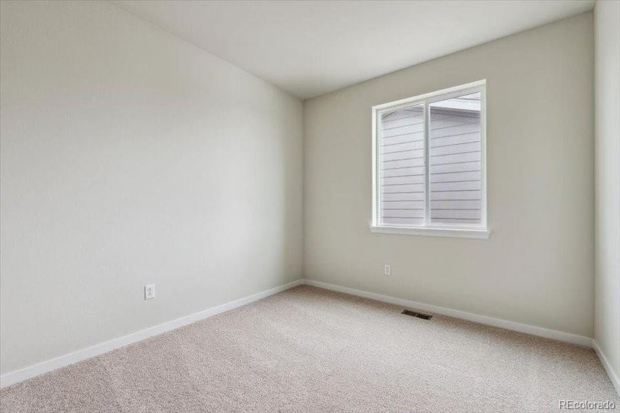 Spacious, unfurnished interior of a new home in Red Barn Meadows, Mead (Image 22).