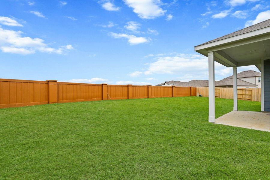 Exterior details and patio area of a home in Sanford Farms, Waller (Image 19). Exterior details and patio area of a home in Sanford Farms, Waller (Image 19).