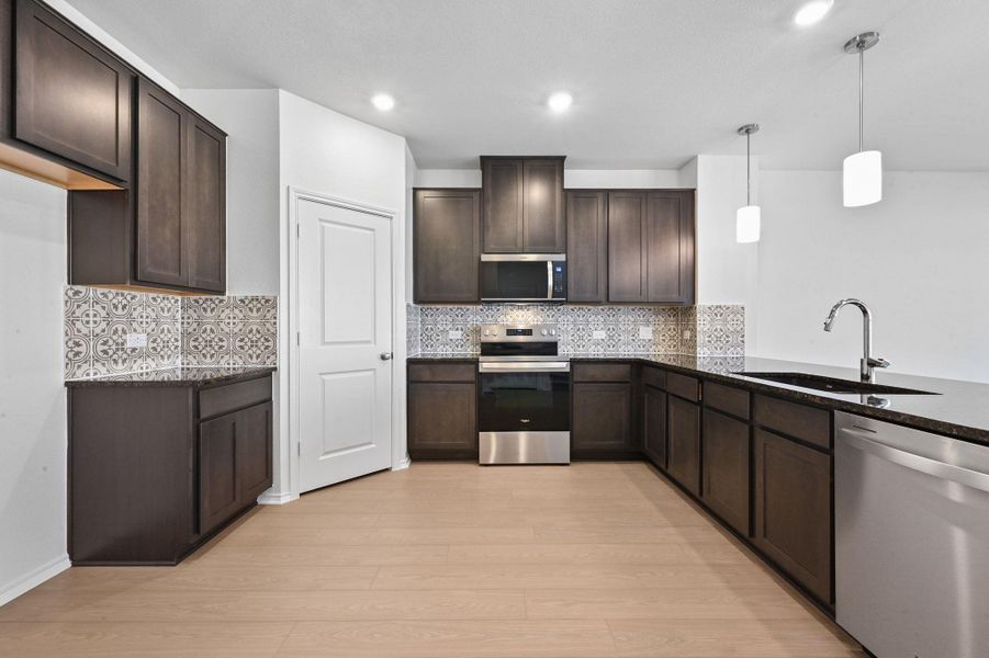 Furnished interior view inside a new home in Creekside at Estancia, Austin (Image 6).