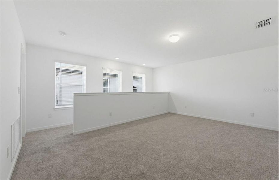 Spacious, unfurnished interior of a new home in Vida's Way, Wesley Chapel (Image 14).