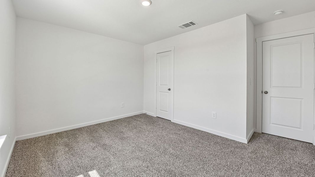 Spacious, unfurnished interior of a new home in Monarch Ranch, Manor (Image 43).